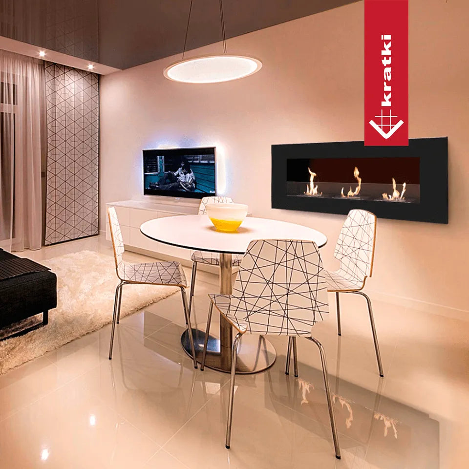 Moderne eetkamer met Kratki Delta3 haard aan de muur, ronde tafel en designstoelen.
