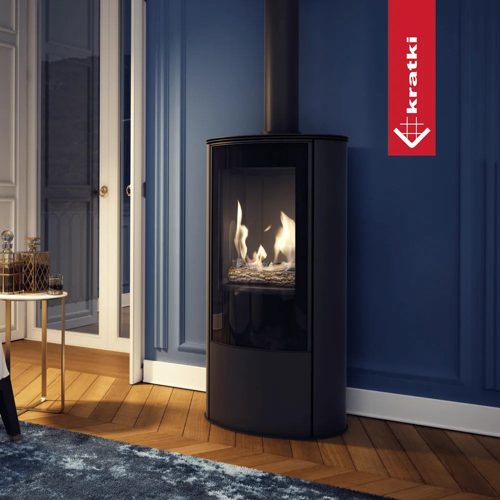 Kratki AB Enyo R Gas haard in een stijlvolle, moderne woonkamer met blauwe muren.