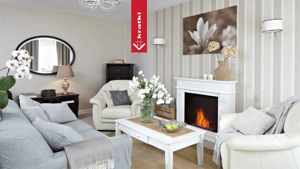 Gezellige woonkamer met Kratki November TÜV haard, bloemen en comfortabele zitplaatsen.