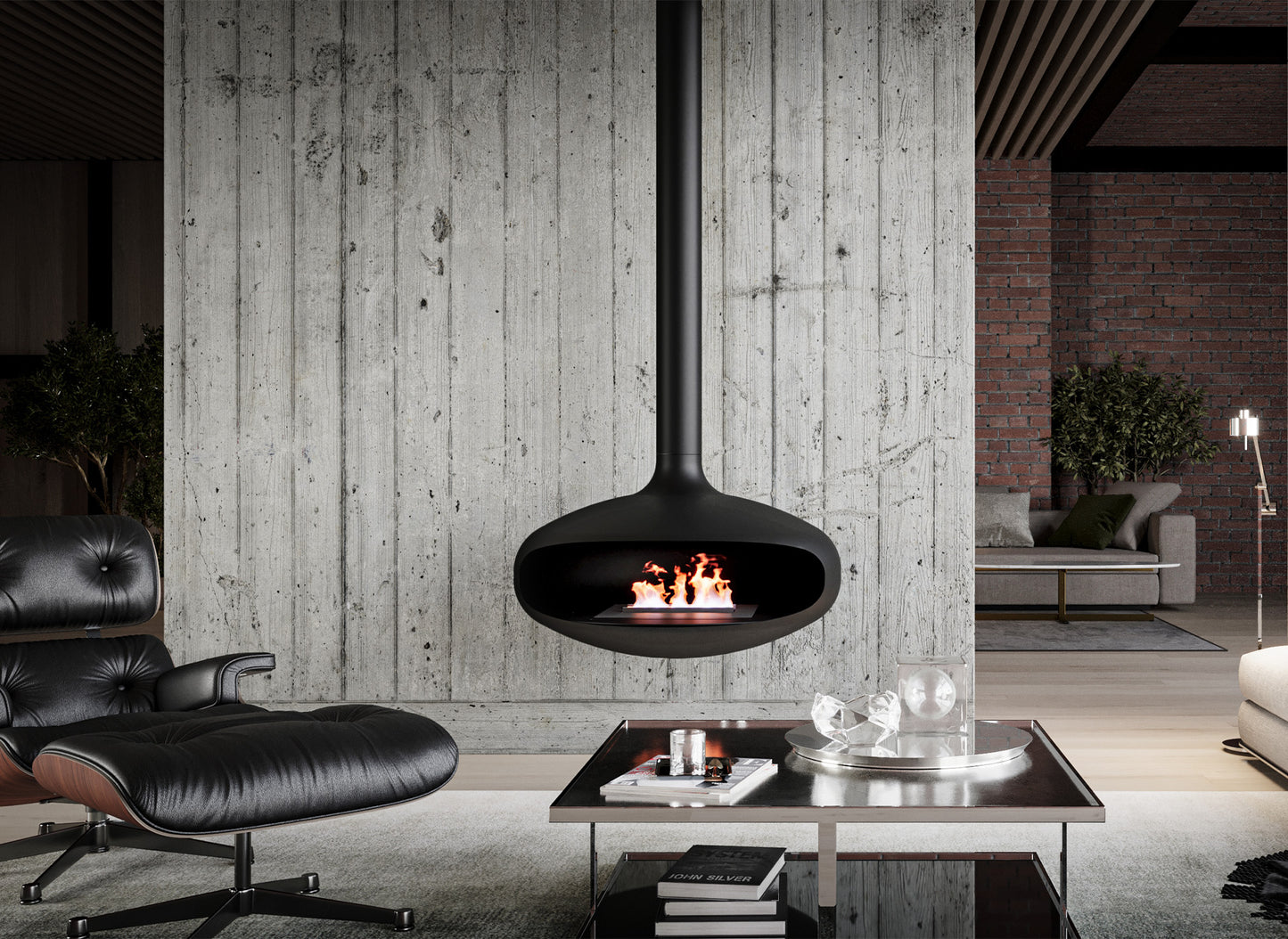Icon Fires The Iconic 900 hangend in een moderne woonkamer met betonnen muur en leren stoel.