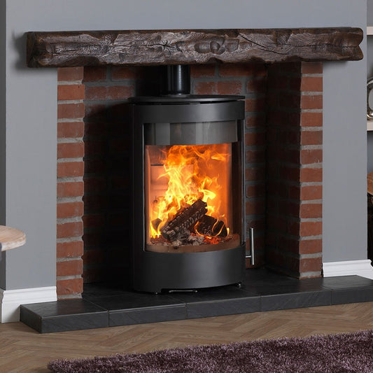 Charlton & Jenrick Purevision vrijstaand rond model in schouw met brandend vuur