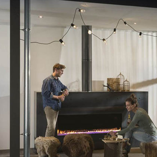 Element4 Summum 140 front outdoor in moderne ruimte met brandende inbouwhaard