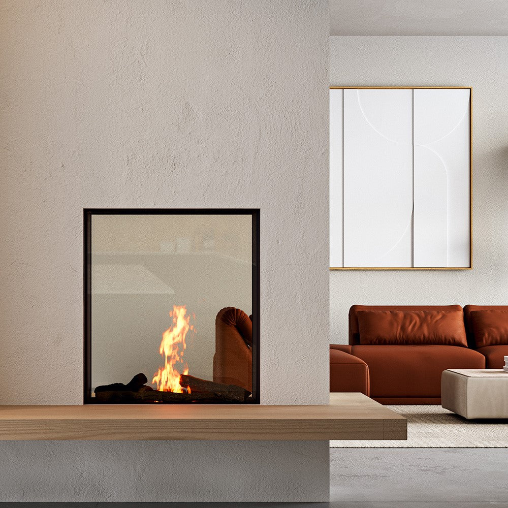 Element4 Sky Small Tunnel Bio in een moderne woonkamer met een bruine bank en abstract kunstwerk.