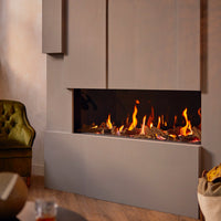 Trimline Fires 120 Front in woonkamer met brede inbouwhaard en vlammen