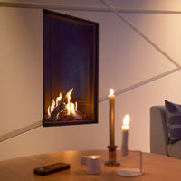 Trimline Fires 55XH Front in moderne woonkamer met brandend haardvuur