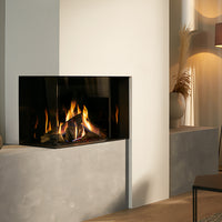 Trimline Fires 64 Corner haard in moderne woonkamer met zichtbare vlammen