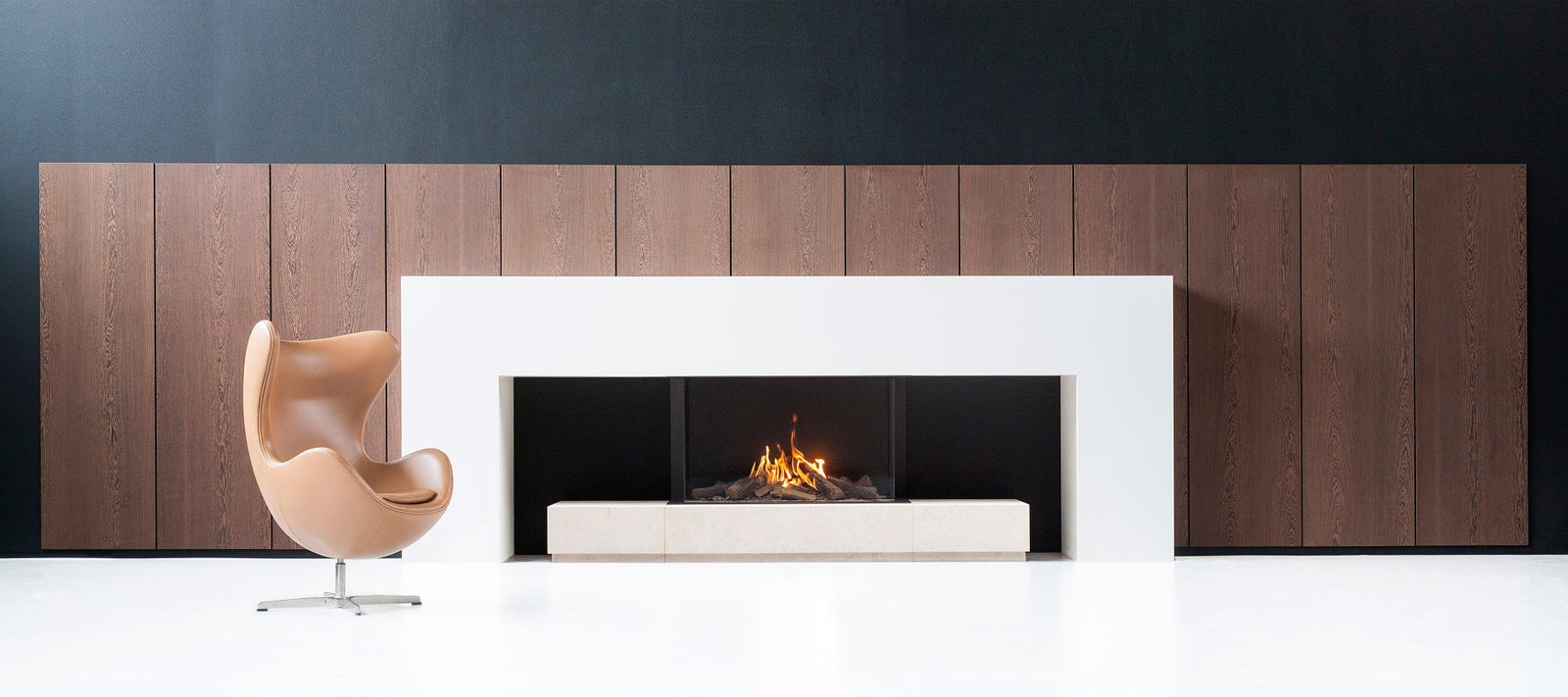 Faber Matrix 1050/650 III driezijdige haard in moderne woonkamer