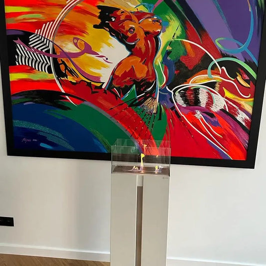 Kratki Romeo TÜV bio-ethanol haard voor kleurrijk abstract schilderij.