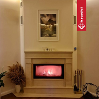 Kratki Lucy CV ingebouwd in beige schouw met brandend vuur
