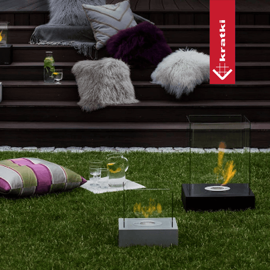 Kratki Tango4 terrasvuurtafel met glazen windscherm in tuin