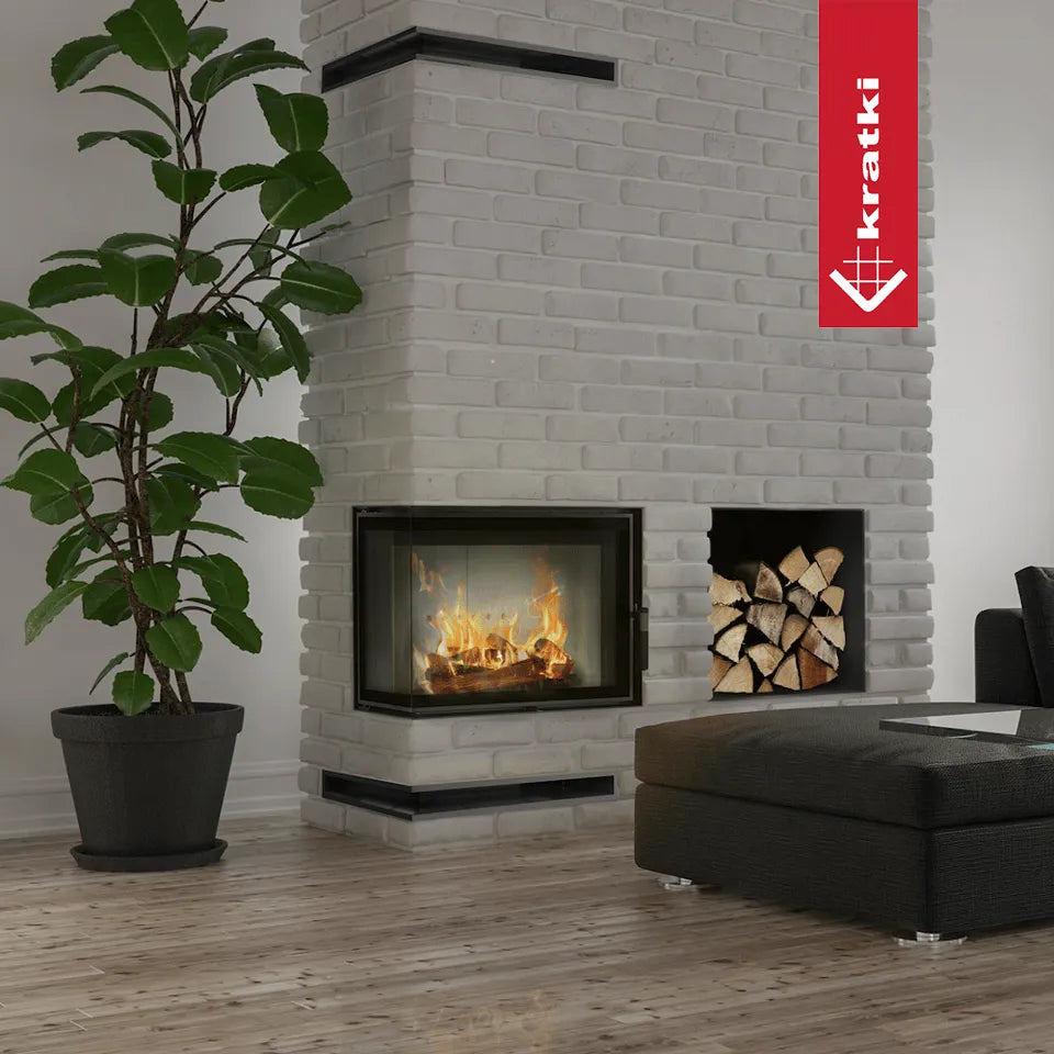Kratki Lucy 12 kW Slim Links haard in moderne woonkamer met witte bakstenen muur.