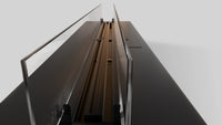 Detail van de Balstil FF 1000 met glazen panelen en langwerpige brander.
