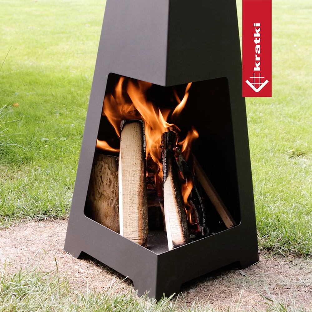 Kratki Pylos vuurschaal met brandend hout op gras