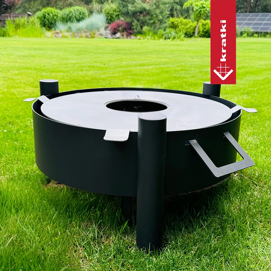 Kratki Rotondo vuurkorf op gras in de tuin