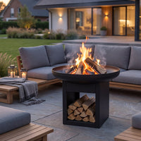 Kratki Crater 600 vuurtafel met brandend hout in tuin