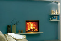 Spartherm Linear Front 67x51 (vaste greep) ingebouwd in blauwe woonkamerwand met brandend vuur