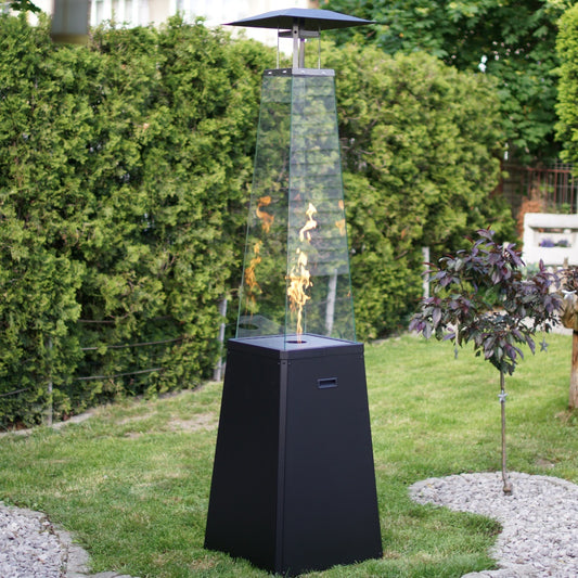 Kratki Umbrella BS buitenhaard op gras in tuin met vlammen