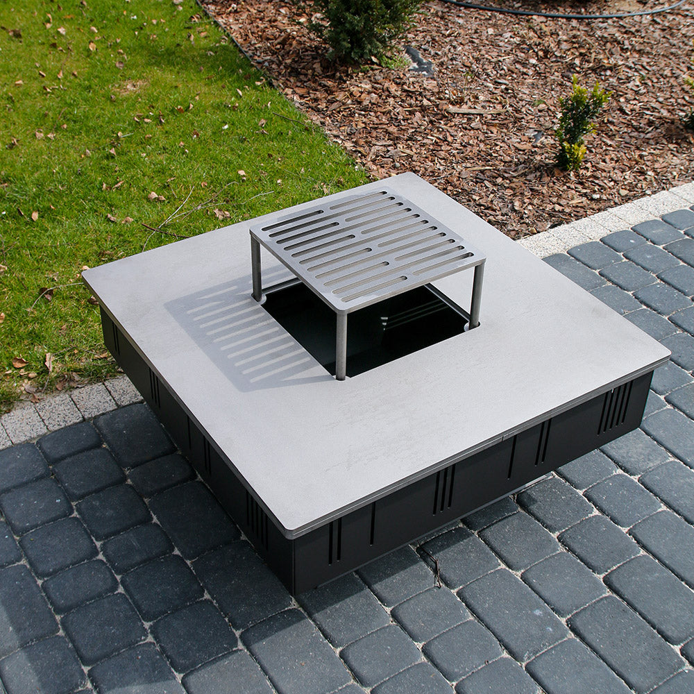 Kratki Quadrum BBQ buitenhaard met grillrooster op terras