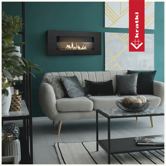 Kratki Delta wandhaard in groene woonkamer boven beige bank