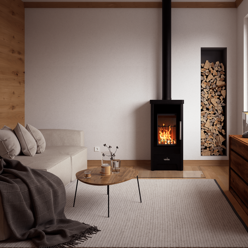 Verner 13/10.2 houtkachel in moderne woonkamer met brandend vuur