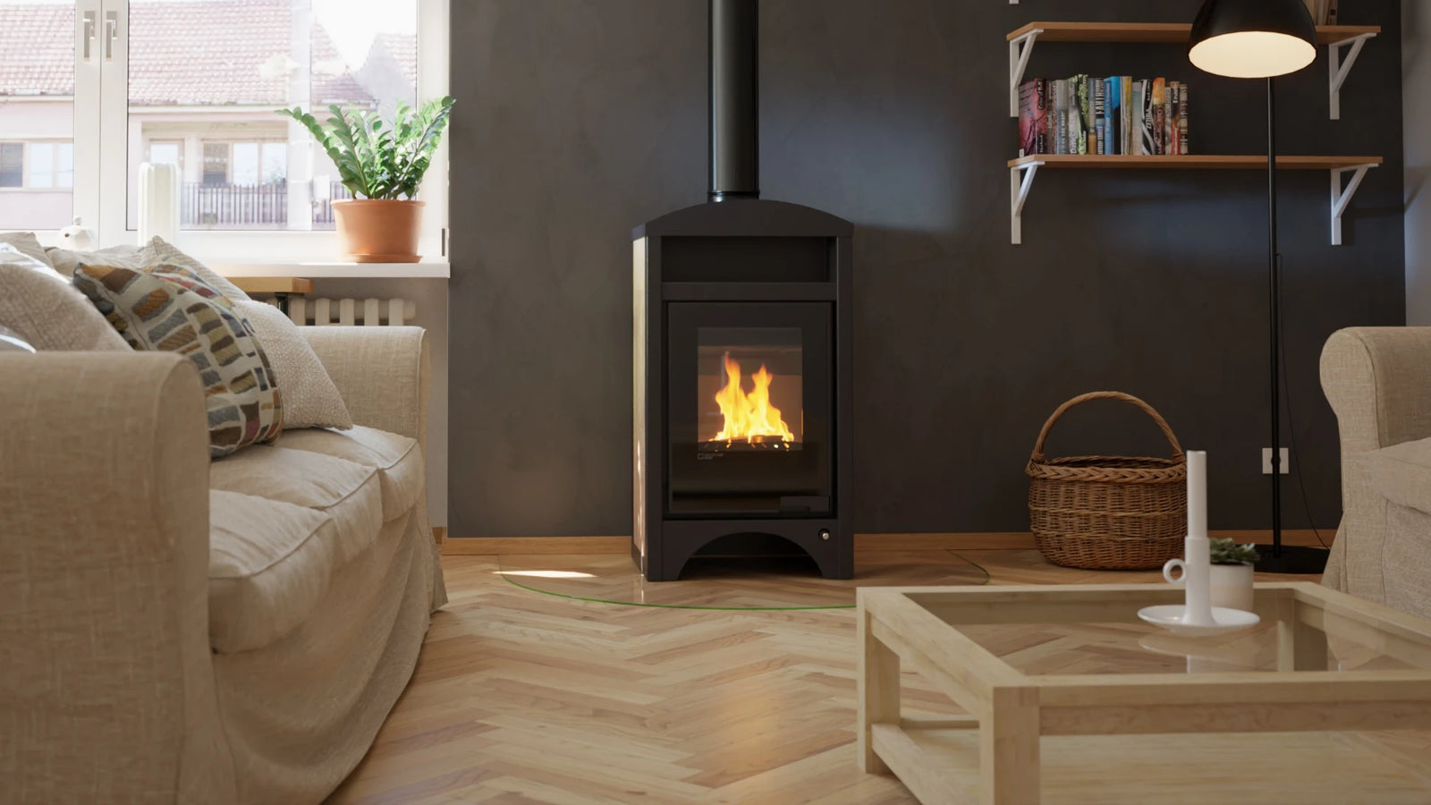 HS Flamingo Aquaflam Vario Barma Air houtkachel in een woonkamer met brandend vuur