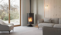 HS Flamingo Masterflamme Grande in een moderne woonkamer met brandend vuur