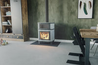 Altech Grande Nobles Gourmet houtkachel in moderne woonkamer