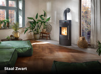Olsberg Bacan Staaldeur in moderne woonkamer met brandend vuur
