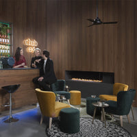 Element4 Club 140 C in moderne lounge met bar en wandhaard