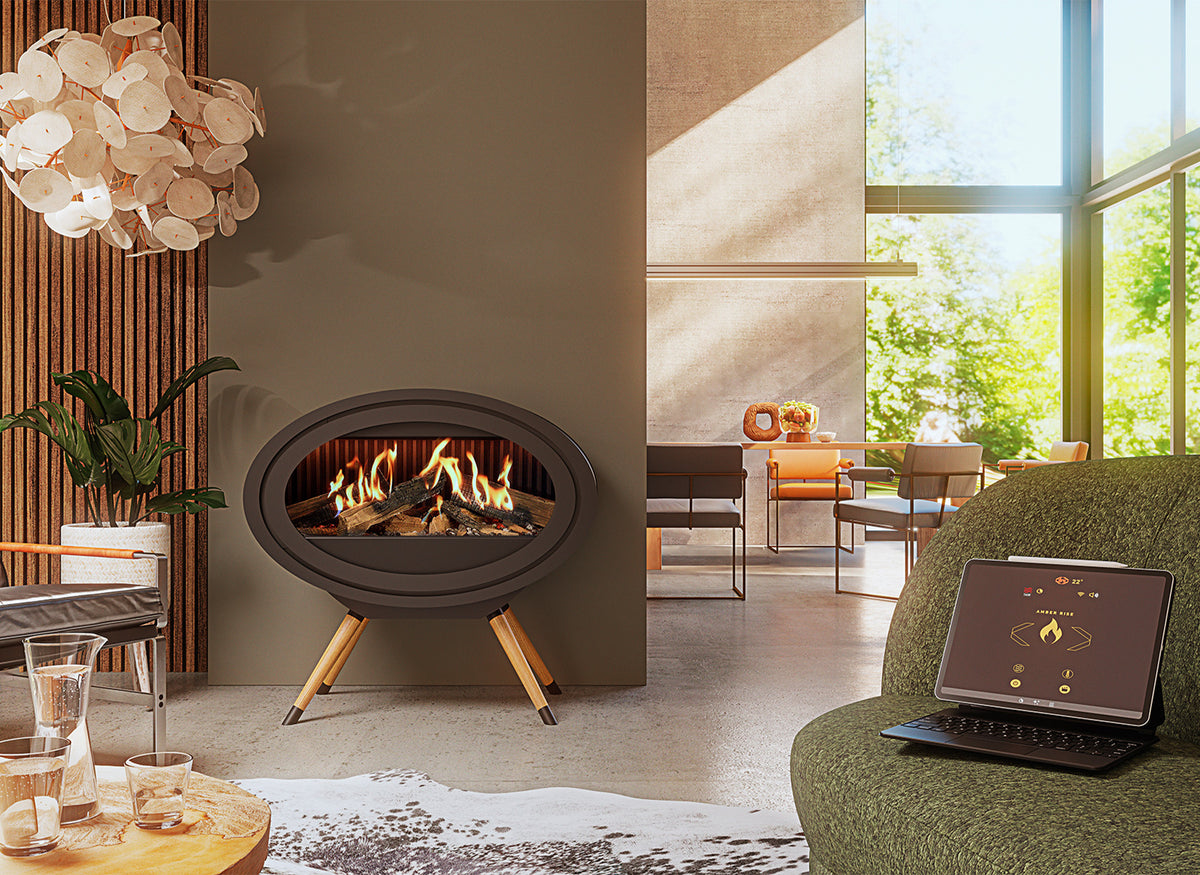 Dru Oval Evolve haard met brandende vlammen in een moderne woonkamer.