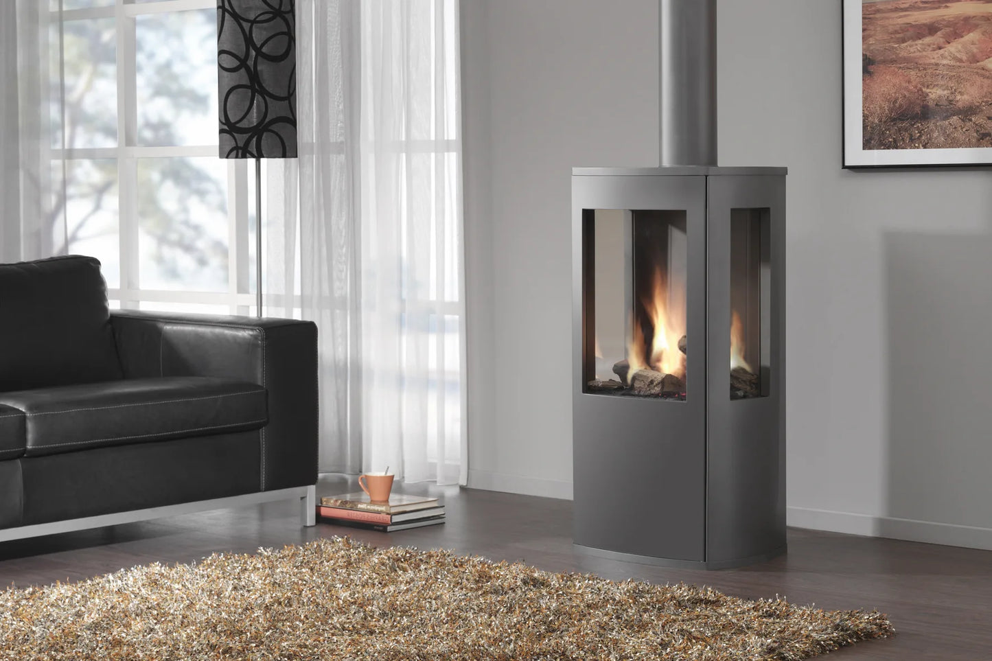 Dru Trio gaskachel met vlammen, grijze behuizing en glazen ruiten