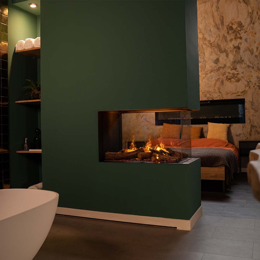 Faber e-MatriX Mood 800/500 RD in een moderne, sfeervolle kamer met groene muren.