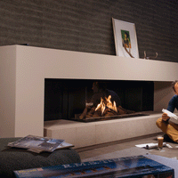 Faber Matrix 1050/500 III Driezijdig in moderne woonkamer met brandend haardvuur