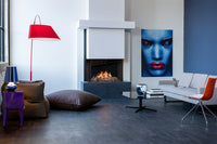 Faber Matrix 800/650 III Driezijdig in moderne woonkamer met brandend vuur
