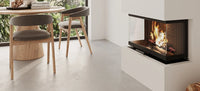 Nordic Fire Elite 3 in moderne woonkamer met eettafel en stoelen