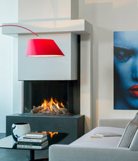 Faber Matrix 800/650 III Driezijdig in moderne woonkamer met brandend haardvuur