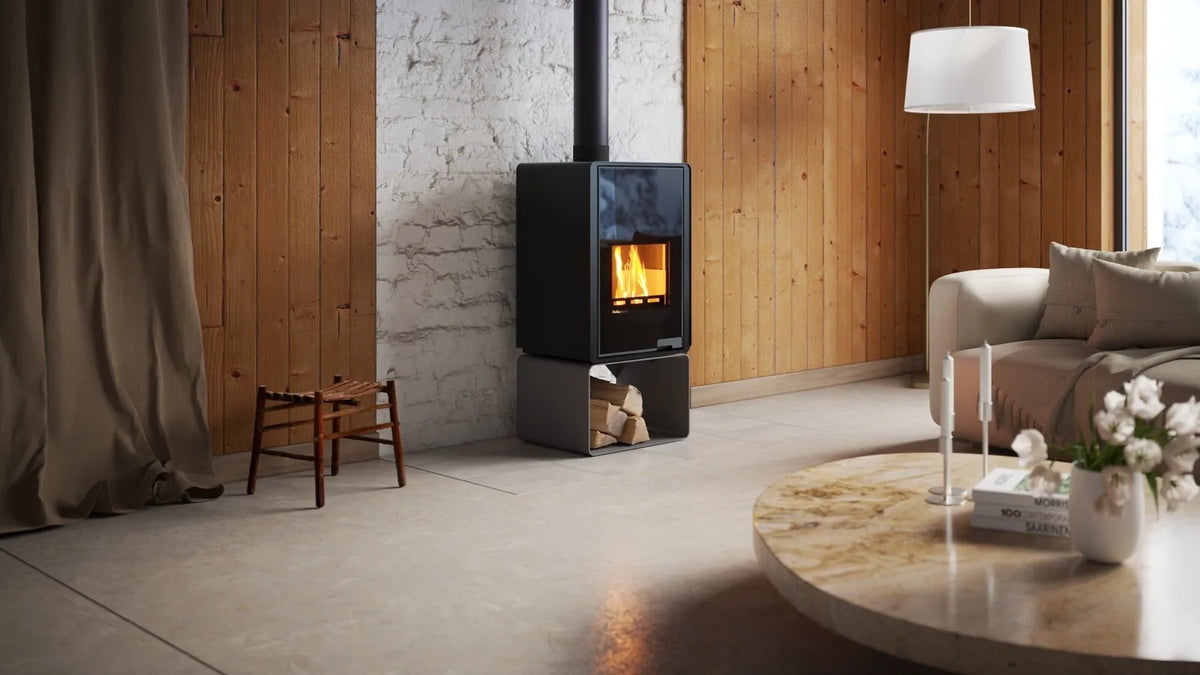 HS Flamingo Deluxe Pentai houtkachel met brandend vuur in een stijlvol interieur