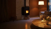 HS Flamingo Deluxe Pulau houtkachel met brandend vuur in een sfeervolle woonkamer