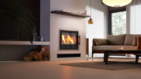 HS Flamingo M9 Inzet ingebouwd in een moderne woonkamer, brandend met zichtbare vlammen.