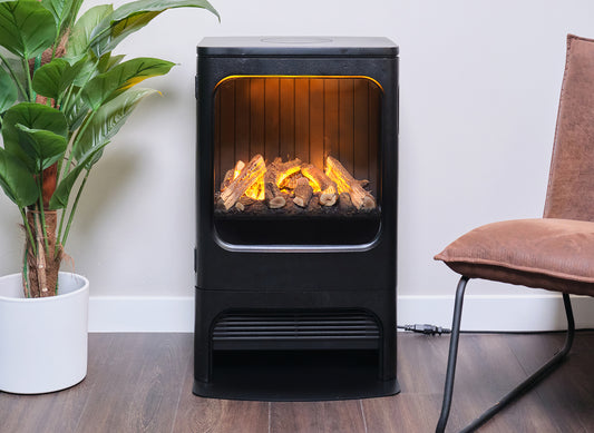 Dimplex Mapleton 80 elektrische haard in woonkamer met plant en stoel