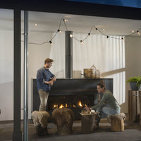Element4 Modore 140 outdoor in moderne woonkamer met brandende haard