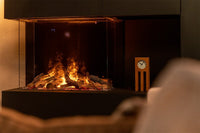 Faber e-MatriX Mood 800/650 III driezijdig in moderne woonkamer met brandend vuur