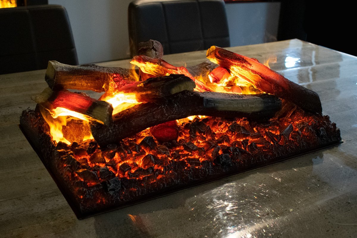Dimplex Cassette 500 Retail elektrische haard met gloeiende houtblokken op tafel