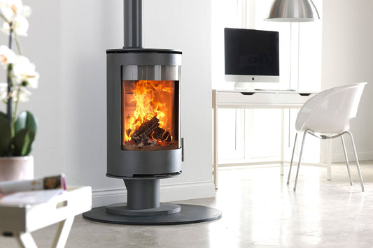 Charlton & Jenrick Purevision vrijstaand rond model voetstuk laag met brandend vuur in moderne ruimte