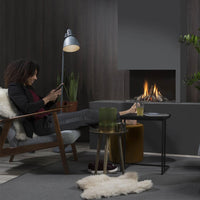 Element4 Summum 70 C Hoek in een moderne woonkamer met brandend haardvuur