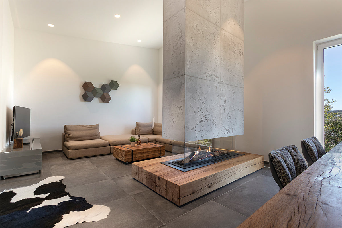 Element4 Summum 140 4-zijdig in moderne woonkamer met centrale haard