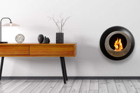Cocoon Fires Vellum zwarte wandhaard met vlam in moderne woonkamer