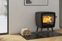 Dovre Vintage 35 houtkachel in woonkamer met brandend vuur